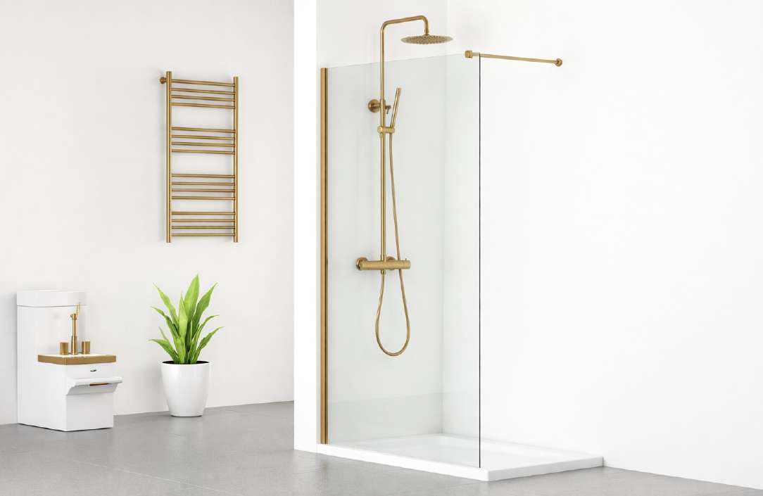 Bright modern bathroom with brushed brass fixtures and walk-in shower